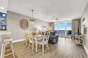 spacious living, dining and kitchen with view from each room