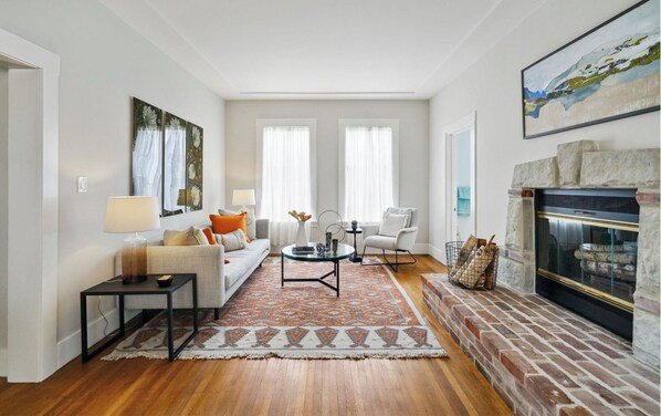 Living room, fireplace and bathroom door