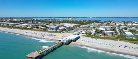 Enjoy the iconic Cocoa Beach Pier, offering beautiful views, dining, shopping, and endless fun just moments away!