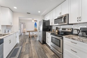 Kitchen with stainless steel appliances.