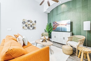 Cozy up in this stylish lounge with a warm, inviting vibe. Perfect for movie nights, relaxing, or unwinding with your favorite show.