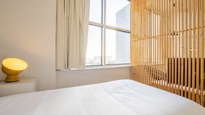 Our studio is divided by a wood partition, so you'll have more privacy and comfort #sleek #contemporary