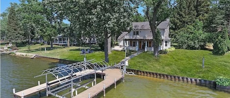 View of house and private dock. Plenty of room to dock boats and jet-skis.