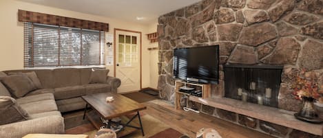 Hi Country Haus - 10-18... - a SkyRun Winter Park Property - Open Living Area with dining table and kitchen  FIREPLACE not for guest use