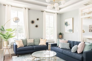 Find solace in the contemporary allure of this cozy living room