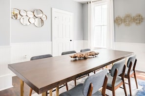 Discover the joy of communal dining in this contemporary and stylish space