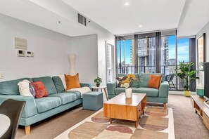 Sit back and unwind from the cosy living room, with a large TV with streaming services. 