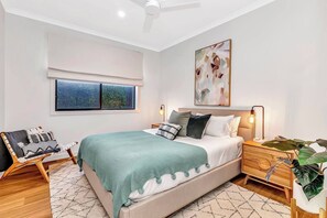  The first queen-sized bedroom is located downstairs and benefits from a private ensuite bathroom.
