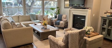 Family Room w/gas fireplace and TV and Amazon power stick.