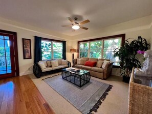 Peaceful living area surrounded by banana forest.