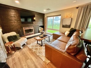 Snuggle in for a movie night or grab a drink and warm your toes by the fire