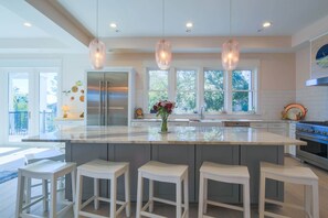 The Porches, which is a newly built custom home, receives fabulous natural light.