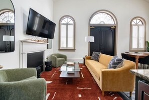 Spacious Living Room with TV