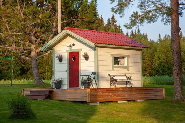 Cute little stuga (Tiny House) at dusk