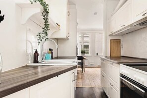 Well-lit space showcasing a functional kitchen layout.