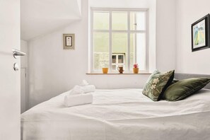 Bedroom 1 offers a comfortable 140cm bed.