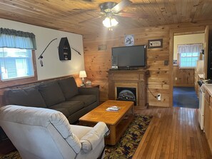 Cozy living room area at Carr's Cottage