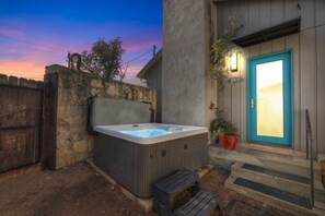 Private patio with hot tub to soak.