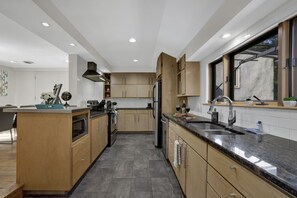 Large kitchen with updated features.