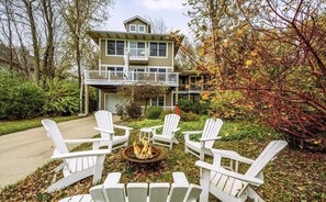 Front with firepit and outdoor seating