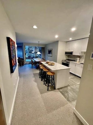 Fully renovated kitchen with breakfast bar