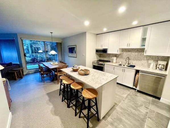 Fully renovated kitchen with breakfast bar