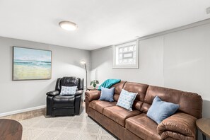 Gather with friends and family in this spacious living room.