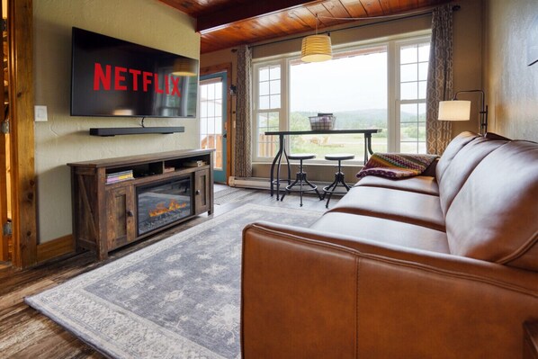 Enjoy Netflix while you snuggle on the leather couch.