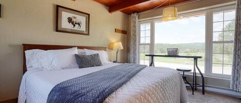 Sleep in a king size bed with nature right out the window.