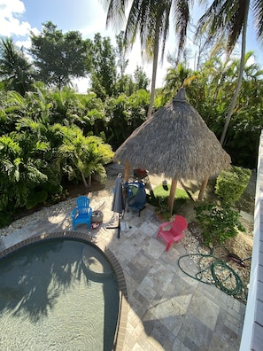 Tiki hut next to pool