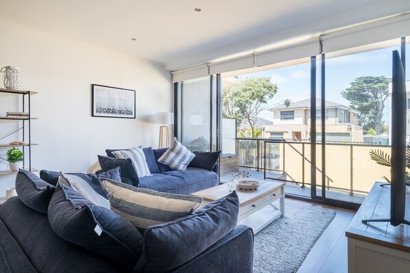 In the light-filled living area, you’ll find two comfy sofas and a TV for relaxed movie nights, with split system heating and air conditioning ensuring year-round comfort.
