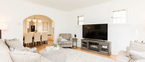 Living room with 65” smart TV and electric fireplace….All new furniture