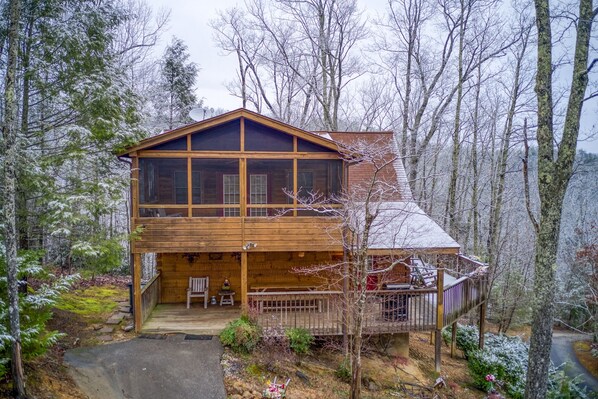 Parking and driveway seen from a drone at Alpine Romance, a 2 bedroom cabin rental located in Pigeon Forge