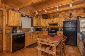 Kitchen with Dining Table at Duke's Den