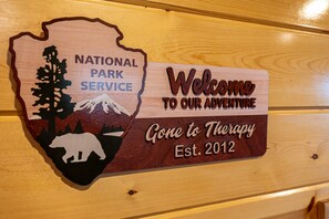 Cabin sign at Gone To Therapy, a 2 bedroom cabin rental located in Gatlinburg