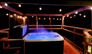 Hot Tub at night at Moonlit Mountain Lodge