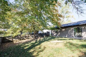 Large fenced in backyard with privacy fence.