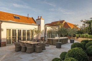 The Beach House, Brancaster: Fully enclosed garden with garden furniture