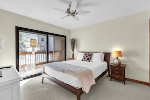 The master bedroom is the perfect place to wind down with a queen bed, a 37” TV, a spacious closet, an ensuite bathroom, and a private balcony.