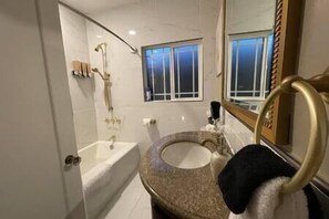 Bathroom with large soaking tub 