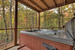 Relax in your private hot tub with nature at your fingertips