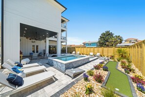 Private Backyard with Heated Pool, Outdoor Putting Green, Cornhole, and Lounge Seating