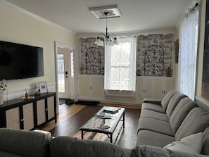 Spacious living room with all the charm