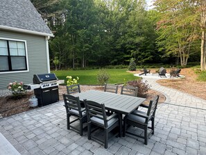 Outdoor seating with private, peaceful view and nice grass area for games