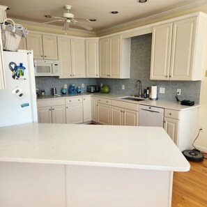 Well equipped kitchen w/ double oven.  Full refrigerator & freezer in garage too