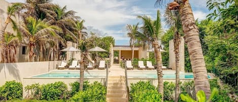 Indulge in Santamar Beach Club's exclusive paradise, luxury, and leisure.