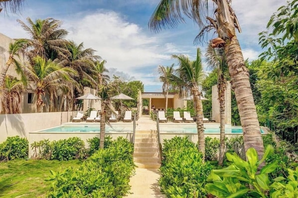 Indulge in Santamar Beach Club's exclusive paradise, luxury, and leisure.