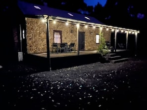 Cottage deck with solar lights.