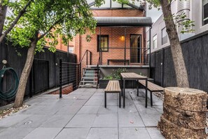 The shared outdoor area provides a peaceful spot for laidback alfresco dining.
