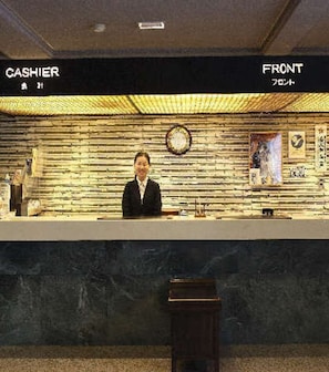 Please come to the front desk first.